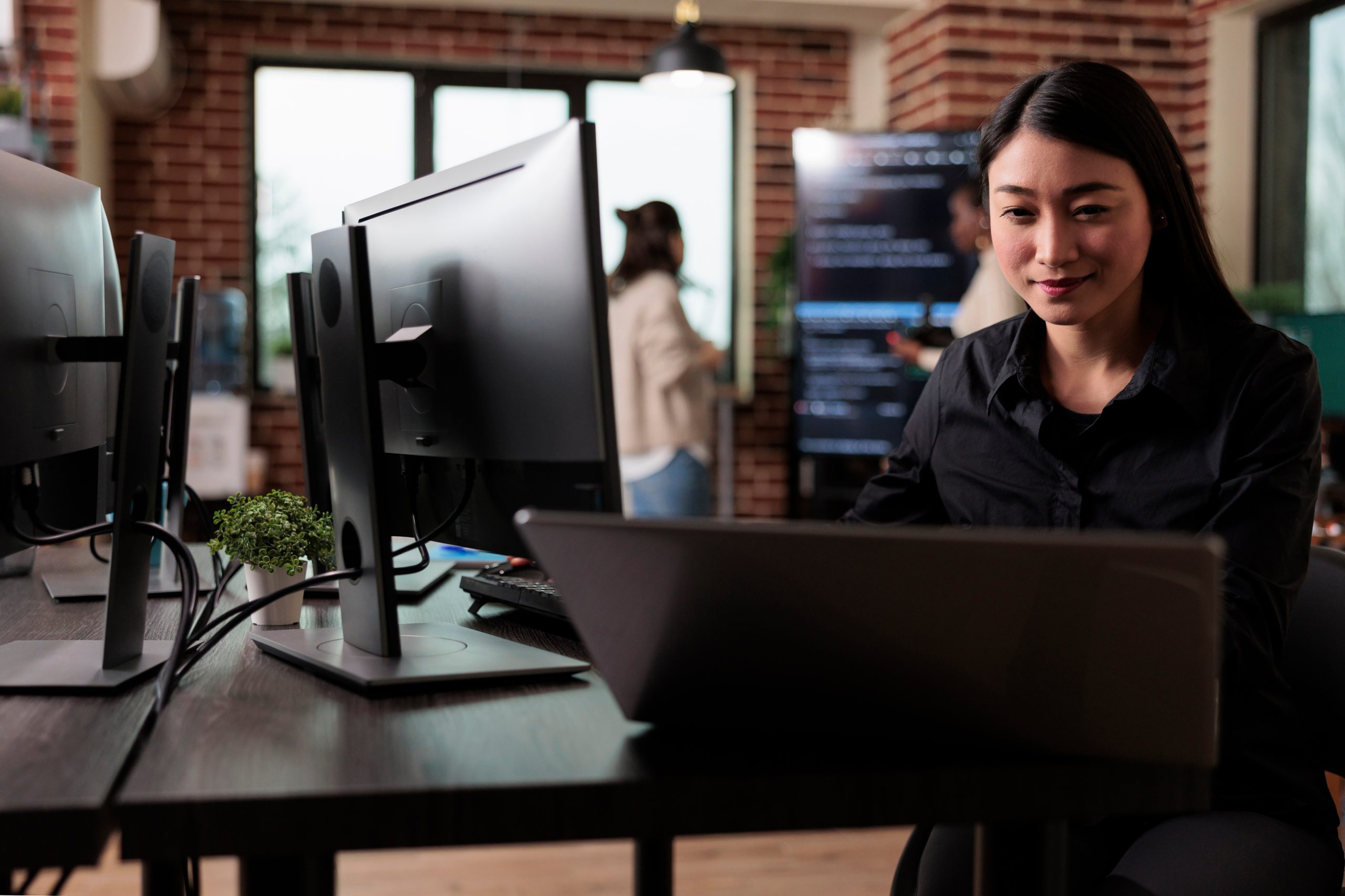 Confident cyber security officer accesing administrator rights by bypassing firewall defence system.