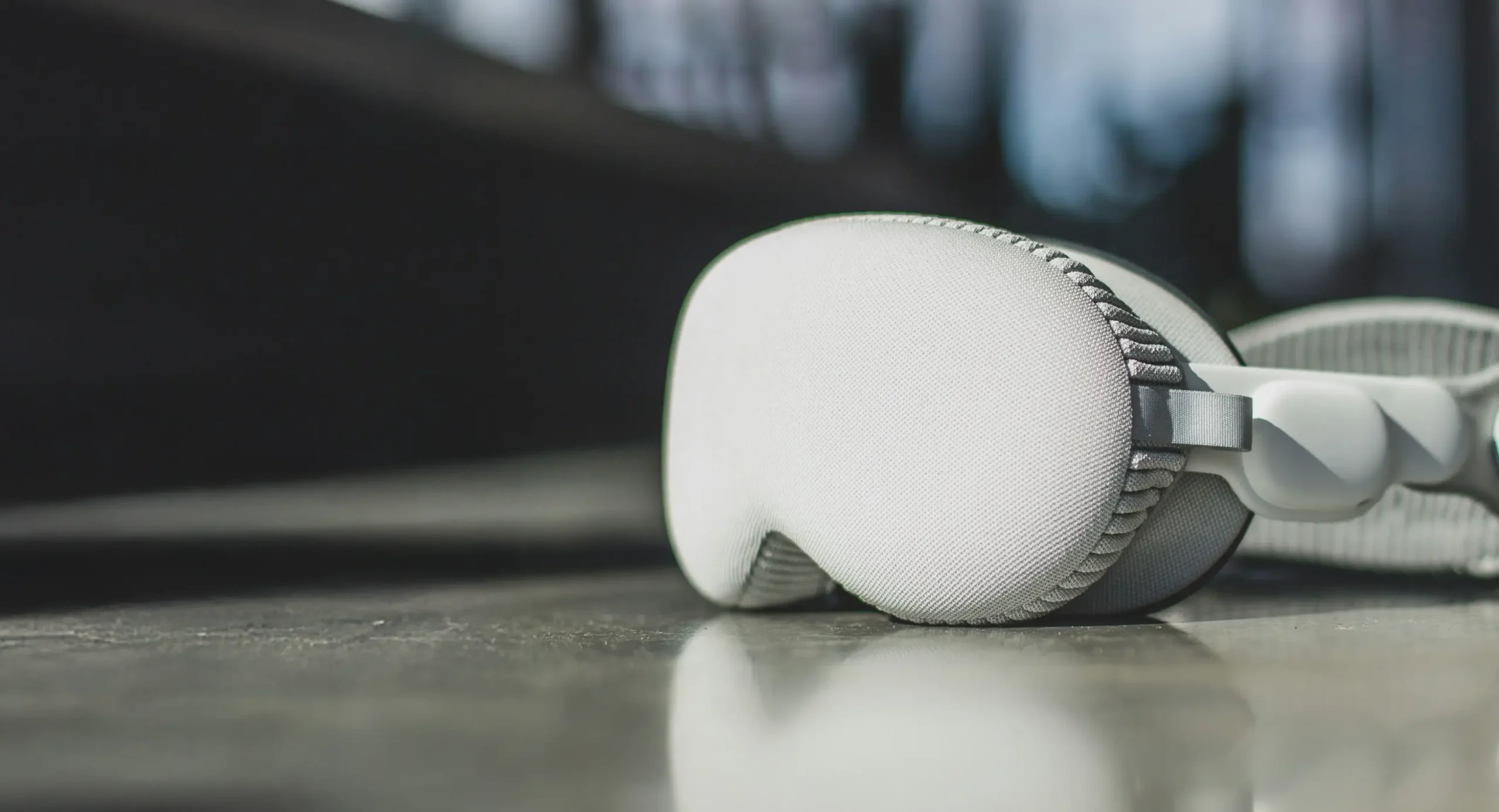 Apple vision goggles on a desk